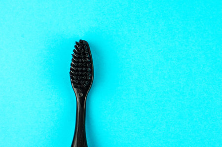 toothpaste and brush on a blue background with place for text. Health, cleanliness and beauty