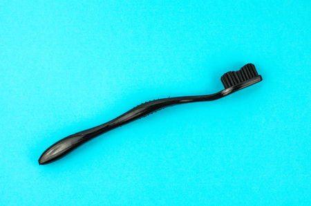toothpaste and brush on a blue background with place for text. Health, cleanliness and beautyの写真素材