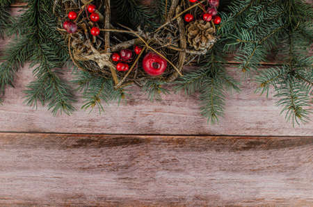Gift boxes with a large red bow against a background bokeh of twinkling party lights. Luxury New Year gift. Christmas gift. Christmas background with gift box. Christmastime celebration. Copy space to text.の写真素材