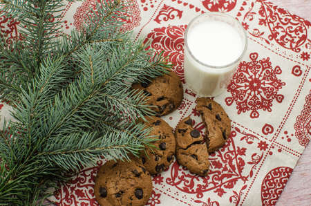 freshly baked chocolate chip cookies on rustic wooden table. Copy space for textの写真素材