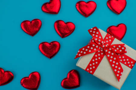 Red rose and Valentines day hearts on wood. copy space for textの写真素材