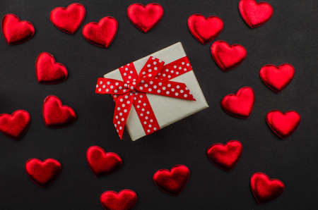 Red rose and Valentines day hearts on wood. copy space for textの写真素材