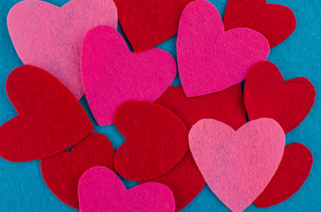Hand made textile red heart. Isolated on white background. Copy spaceの写真素材