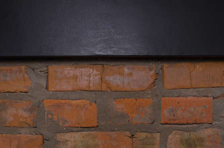 Industrial background, empty grunge urban street with warehouse brick wall. Blackの写真素材