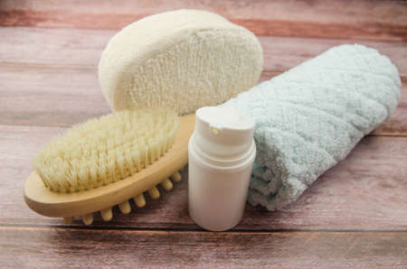 Soft towel and bath accessories on table. Copy spaceの写真素材
