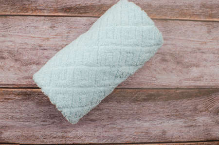 Soft towel and bath accessories on table. Copy spaceの写真素材