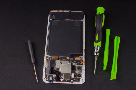 smartphone repair on black background.
