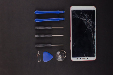 smartphone repair on black background.