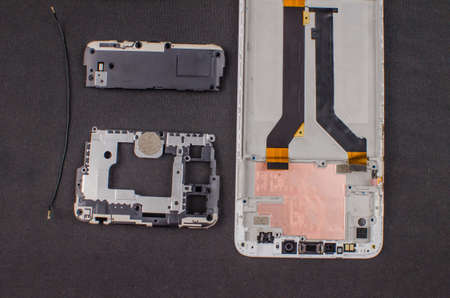 smartphone repair on black background.の写真素材