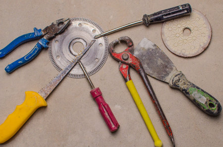construction equipment on concrete background. Tool for work