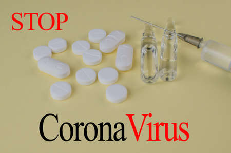 Stop coronavirus 2019. Injections, virus pills. Copy space for textの写真素材