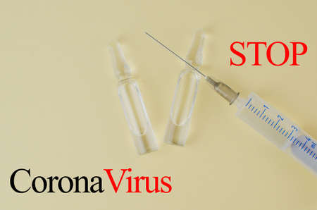 Stop coronavirus 2019. Injections, virus pills. Copy space for textの写真素材