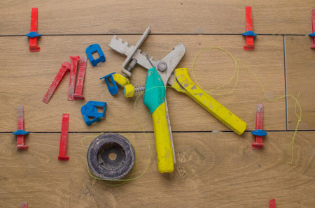A tool for laying ceramic tiles in the form of a tree.Trowel, toothed spatula, fishing line, ruler,...