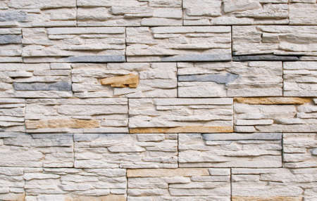 Decorative bricks in the interior in cream and gray colors, brickwork, wall design.の写真素材