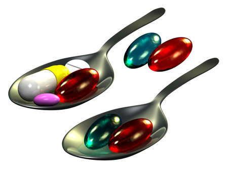 Pills on spoon, white backgroundの写真素材