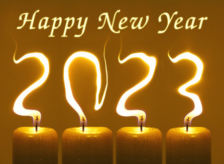 Modified photo of four candles. Flames write numbers 2023, title Happy new yearの写真素材