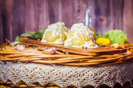 Potato dumplings with sour cream on a rustic background. Zeppelins - the Lithuanian national dish, Selective focusの写真素材
