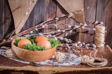 The eggs in wooden bowl