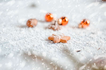 Small baubles in snowの写真素材