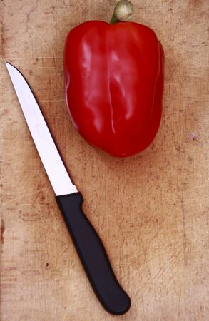 bell pepper on chopping boardの写真素材