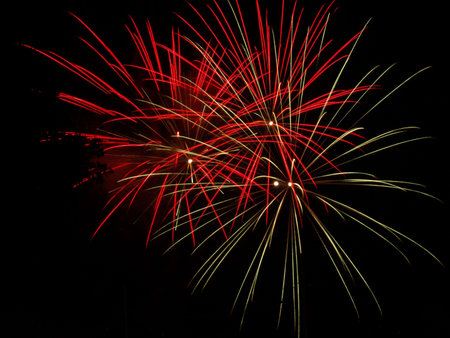 red  and golden fireworks displayの写真素材