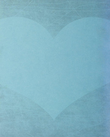 Blue heart on a grungy background 	