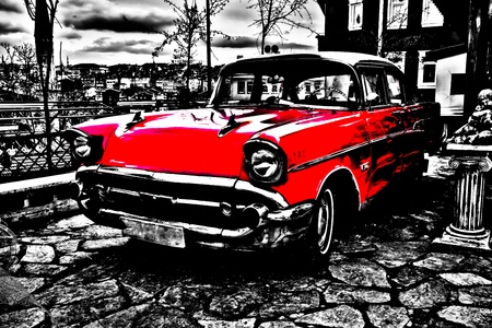 dramatic red car, over exposureの写真素材