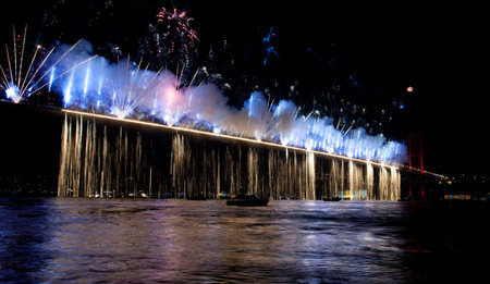 Fireworks and light show at  Bosporus Bridge Istanbul Turkeyの写真素材
