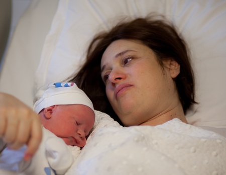 mother and newborn first meetingの写真素材