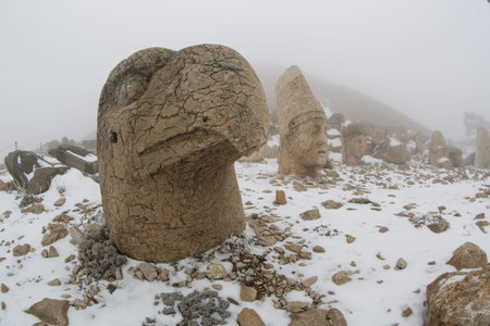 Commagene Kingdom  Komagene Krall built on the mountain top a tomb-sanctuary flanked by huge statues at Mount Nemrut Turkeyの写真素材