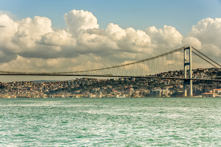 Bosphorus Bridge Istanbul Turkey at cloudy day and blue skyの写真素材