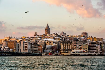 Galata Tower a cloudy sunset at Istanbul Turkeyのeditorial素材