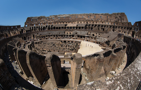 A inside view of ancient Colosseum in Rome Italy at sunny sumer dayの写真素材