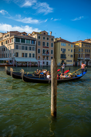 Venice city scape with streets, bridges,buildings and boats on canal in beautiful romantic city  Venice Italy at sunny summer dayの写真素材