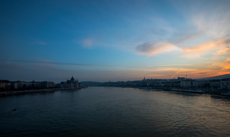A view of Budapest city scape Hungarian Parliament building and Danube river at evening timeの写真素材