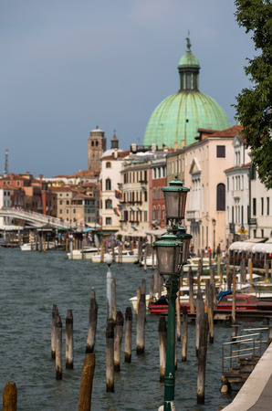 A view of Venice city with Grande canal and Basilica di Santa Maria della Salute at sunny summer time Venice Italyの写真素材