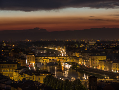 Aerial view of Florence skyline with Duomo, Palazzo vecchio and Arno river Florence, Italy at nightの写真素材