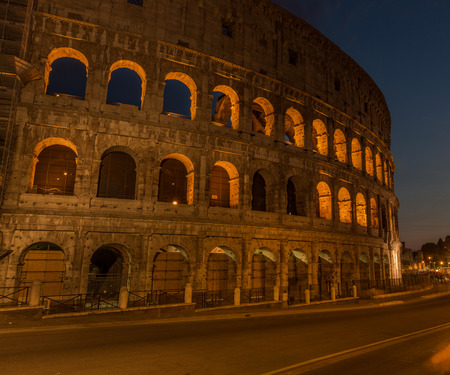 A night view of ancient Colloseum rome italyの写真素材