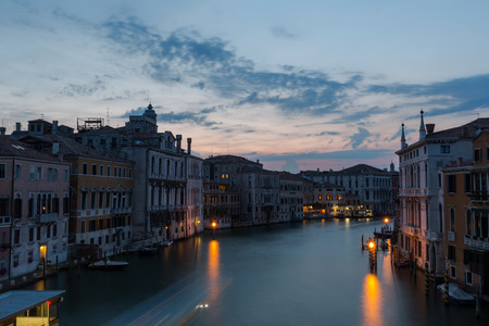 Venice city scape with narrow streets, bridges,buildings and boats on canal in beautiful romantic city  Venice Italy at evenin summer timeの写真素材