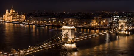 BUDAPEST, HUNGARY - JANUARY 17, 2019 : A view of Chain Bridge on Danube river and Parliament building at nightのeditorial素材