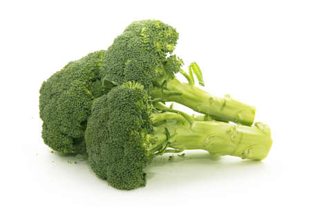 Fresh green broccoli bunch isolated on a white backgroundの写真素材