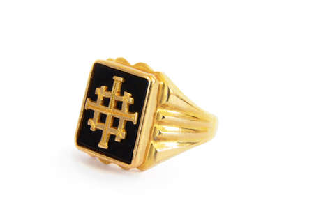 A traditional Ethiopian hand made mens ring with a cross in the middle with onyx backgroundの写真素材