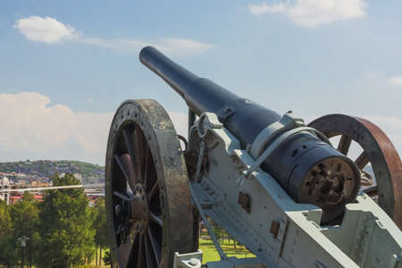 An old cannon  pointing at the mountainsの写真素材