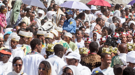ADDIS ABABA, ETHIOPIAâ€“ JANUARY 19: A large crowd of people ccompany the Tabot, a model of the...