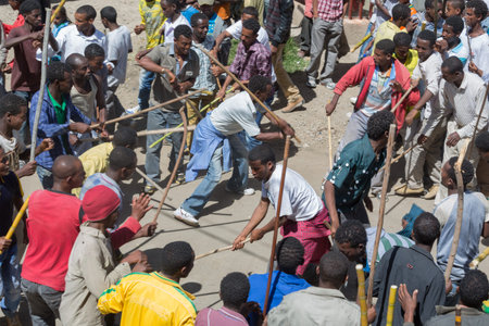 ADDIS ABABA, ETHIOPIAâ€“ JANUARY 20: Young men perform the traditional ceremonial stick fight...