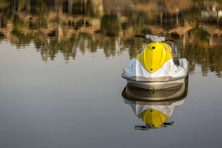 A Jetski parked on the still waters of lake langanoの写真素材