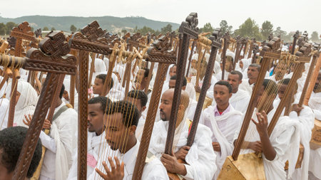 Clergy playing the Begena, a traditional string based instrument, while accompanying the Tabot, a...