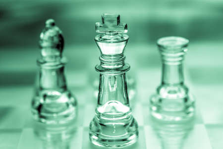 bishop, king, and rook chess pieces made out of glassの写真素材