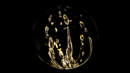 A golden sphere of splashing water frozen in actionの写真素材
