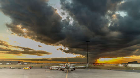 A plane being prepared for takeoff at an airportのeditorial素材